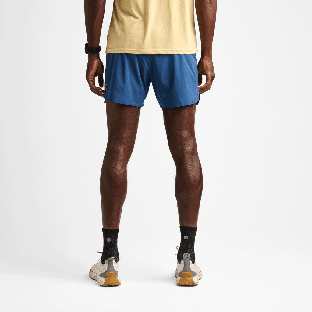 Roark Men's Running Gear | on body view of the Alta 5" Shorts in Denim Blue. Big Image - 4