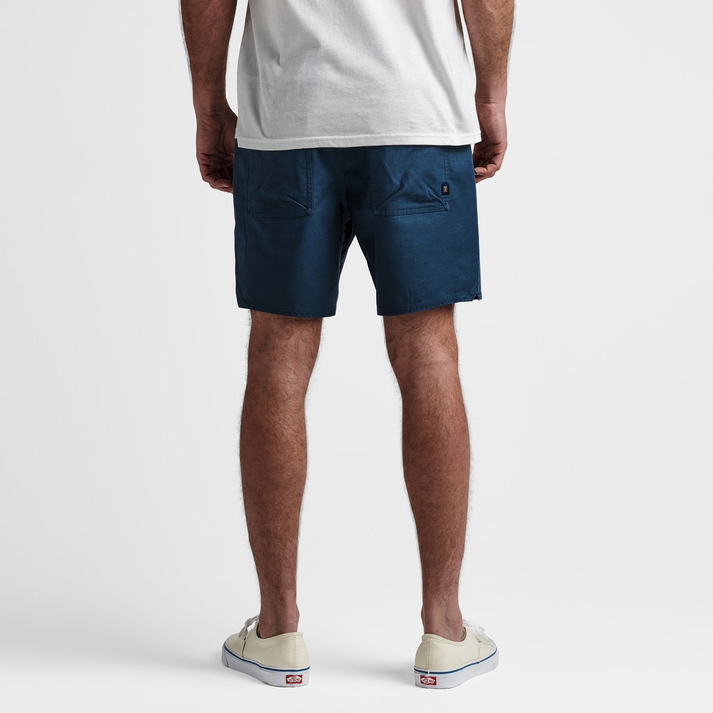 The model of Roark men's Layover Traveler Shorts - Nannai Blue Big Image - 3