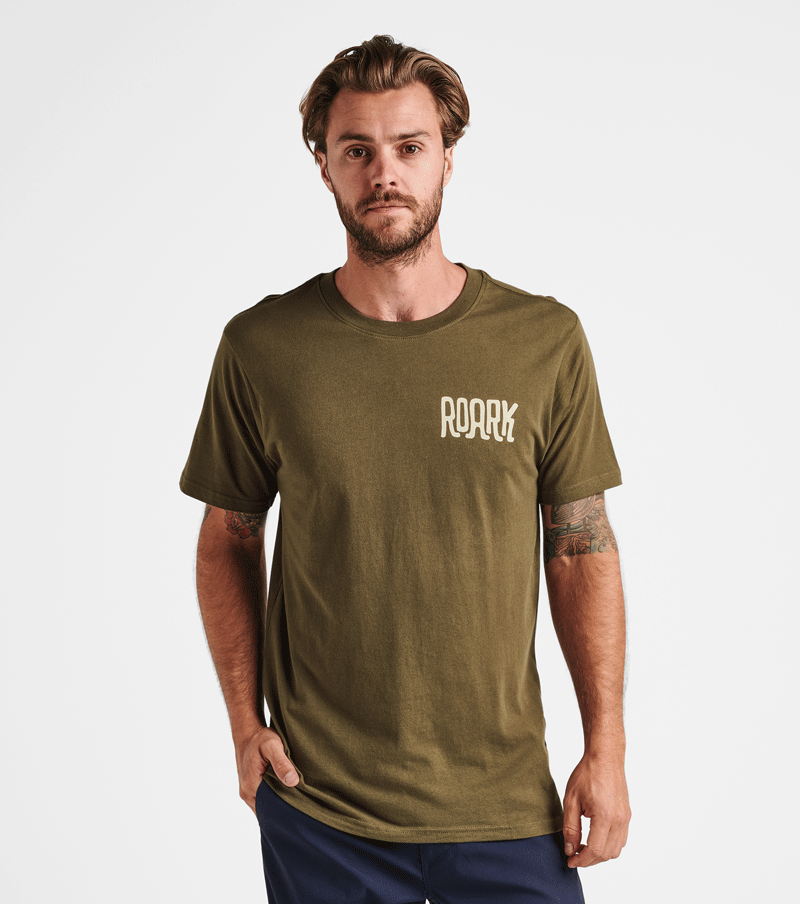 The front view of Roark's By Any Means Tee in Army. Big Image - 4