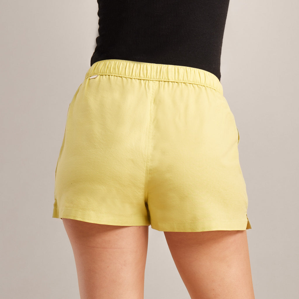 The on body view of Roark women's Idle Shorts - Lime Big Image - 3